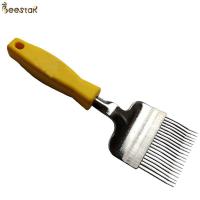 China Durable Yellow Hive Tools stainless steel Honey Uncapping fork with plastic handle on sale