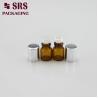 China SRS empty 1ml amber mini glass sample roll on bottle with gold aluminum cap wholesale