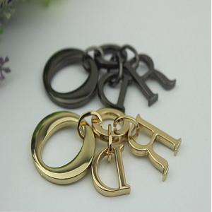 China Bag hardware accessories metal jewelry pendants gold & gunmetal small letters hanging charm supplier