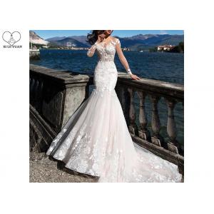 China Unique White Long Sleeve Lace Bridal Gowns Perspective Waist Back Long Fishtail supplier