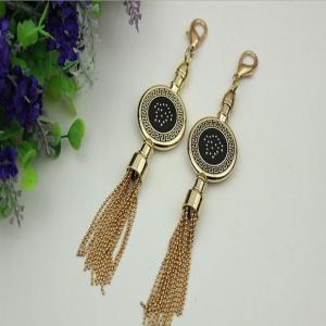 China Novelty DIY high-grade bag hardware accessories light gold drip glue hanging charm with tassel supplier