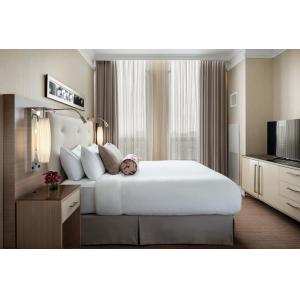 China laminated Oak wood Hotel bedroom Furniture sets Tall headboard with Fabric upholstered padded and TV units Contemporary supplier