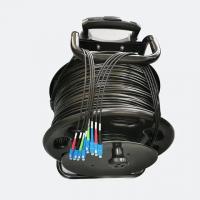 China Portable Retractable Fiber Optic Cable Reel With Length 100M 200M 500M Armored Tactical Fiber Optic Patch Cord on sale