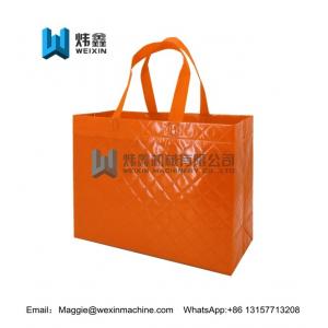 China Orange high quality embossing image non woven tote bag shopping tote bag supplier