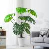China 人工的な緑のmonsteraの家のdecoのホテルのオフィスの鉢植えな木 wholesale