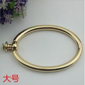 China Unique fashion handbag hardware light gold metal circle handle for tote bag supplier