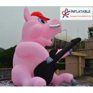 China outdoor inflatable big pig playing guita model for sale supplier