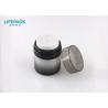 China 30ml Black Cosmetic Containers And Jars / Round Shape Serum Airless Pump Jars wholesale