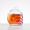 China Transparent Liquor Glass Bottle with Hand Model Creative Design and High Capacity wholesale