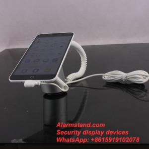 China COMER anti-lost alarm Aluminum Cell Phone Holder Mobile Phone Stand Universal Desktop Charging Dock for iPhone Huawei/LG supplier