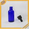 1oz blue glass dropper bottle with black plastic cap