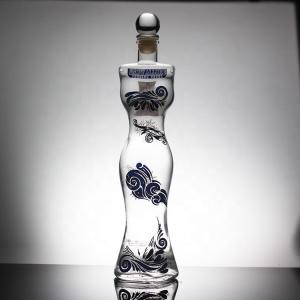 China Beautiful Women Body Shaped Glass Bottle with Cork Sealing Type supplier