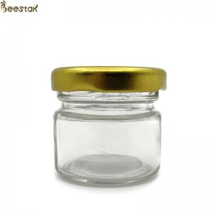 China 25ml glass honey jars bulk Empty Storage Glass Jar Glass Honey Bottles supplier