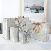 China Marble Pattern Cardboard Gift Bags Thicken Paper Card Ribbon Hand Shopping Bag Reusable on sale
