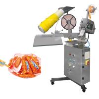 China Fruit And Vegetable Mesh Bag Packing Machine Semi Auto Net Bag Packaging Equipment on sale