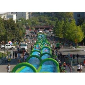 China Outdoor Inflatable Slide The City Huge Water Slide 2 Lanes Quadruple Stitching supplier