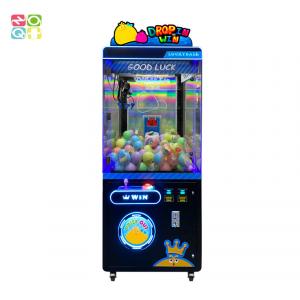 China Drop In Win Claw Crane Machine With Rotating Prize Hole Commercial Ball Catching Machine supplier