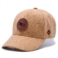 China Curved Six-Panel Wood Grain Leather Baseball Cap With Adjustable Strap on sale