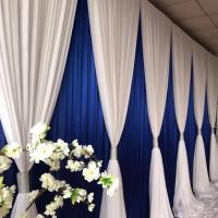 China Hot Sale Wedding Backdrop Blue White Double Drape Cross Valance Luxury Wedding Decoration Backdrop on sale