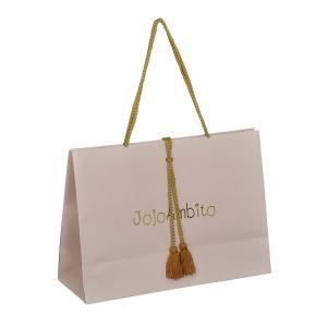 China High quality custom gold stamping logo costmetics packaging paper bags with rope handle supplier