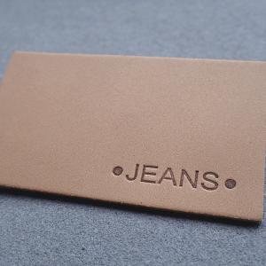 China Hot Stamping Straight Cut Embossed Leather Patches For Jeans supplier