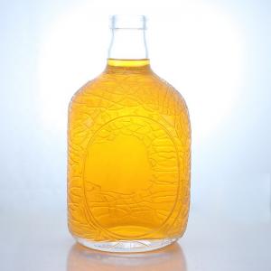China Unique Round Shape Embossed Food Grade Rum Vodka Whisky Tequila Gin Glass Bottle with Cork Perfect supplier