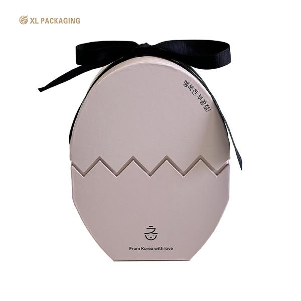 Emballage XL Boîtes de luxe personnalisées en forme d'oeuf rose fantaisie Boîtes cadeau en papier chocolat Emballage pour Pâques avec ruban