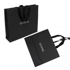 China Full Embossing Black Dyed Garment Paper Shopping Bags With Handles supplier