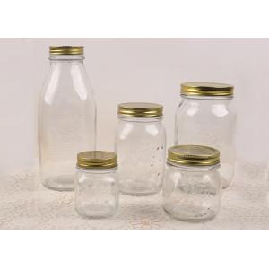 China Clear Carved Glass Storage Jars With Gold Color Screw Lid Round Shape supplier