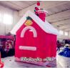 China 2.5m Red Inflatable Christmas Cottage with Santa on Chimney for Christmas Supplies wholesale