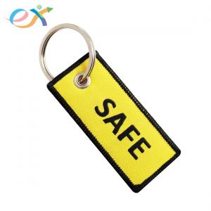 China UK Style woven key tag Double Side Black And Yellow Color With Merrow Border supplier