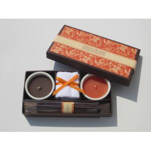 2pk Orange & brown scented ceramic candle with printed label packed into gift box