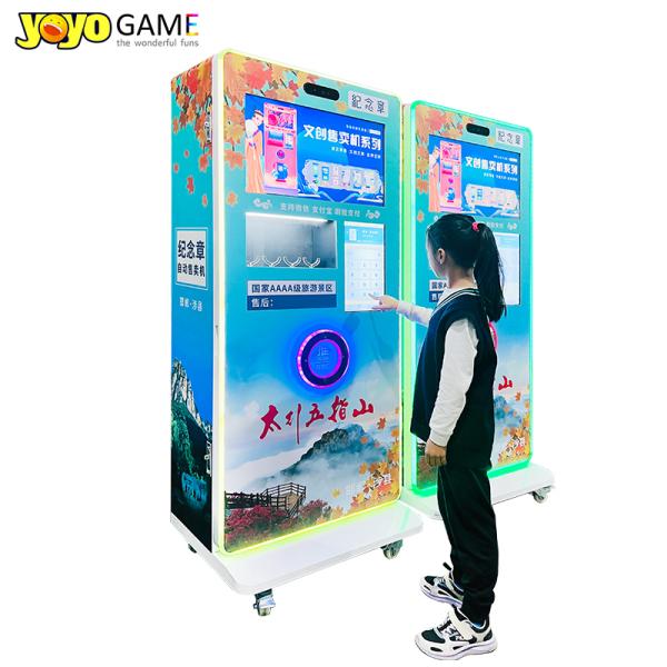300-600 PCS Capacity Medal Vending Machine with 110V/220V Voltage and 1 Year Warranty for Scenic Areas
