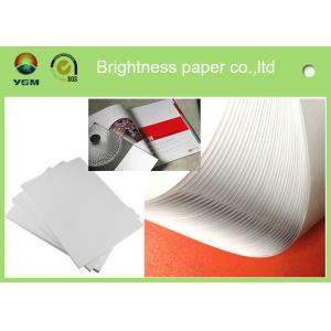 China Good Smoothness White Glossy Art Paper Couch Paper Roll For Printing Magazines supplier