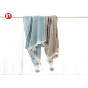 China 100% Cotton Organic Warm Baby knit Blanket Muslin Swaddle Baby Pom Pom throw supplier
