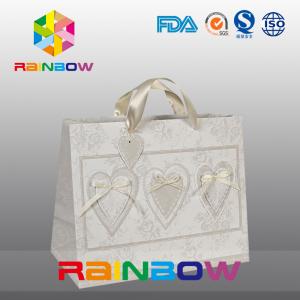 China Unique Design White / Red Custom Printed Paper Bags With Handle supplier