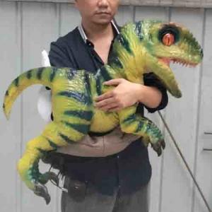 China Cutest popular customizable large simulation waterproof Animatronic Dinosaur baby toy in hands for Theme Park supplier