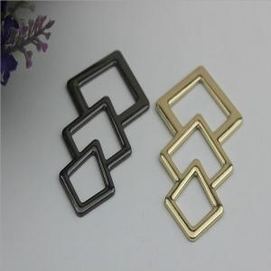 China Novelty design triangle pattern gold & gunmetal zinc alloy metal logo plate for shoes accessories supplier