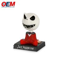 China Customized Solar Powered Bobble Head Dancing Toy OEM Skeletal Action Figurines Made Statues Car Dash Board Decorations on sale