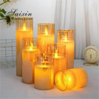 China Hot sale  wedding  decoration real wax flicke moving flame LED pillar candle with glass cups on sale