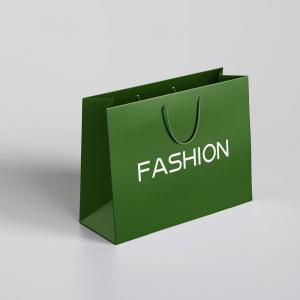 China Christmas Paper Gift Bag with Your Own Logo Made of Ivory Board and Customized Design supplier