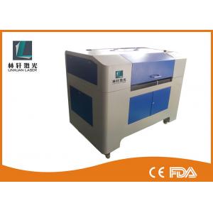 China Artículo completamente automático de la cortadora del grabado del laser del CO2 de 100 vatios con el refrigerador de agua wholesale