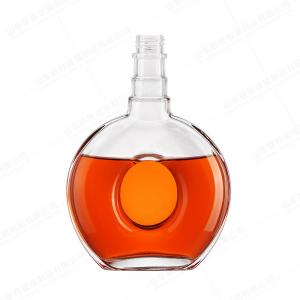 China Customized Color 500ml 700ml 750ml Flat Round Glass Bottle for Beverage Packaging supplier