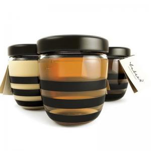 China Honey Glass Storage Jars Honey Bottles Empty Round Small Glass Honey Containers wholesale