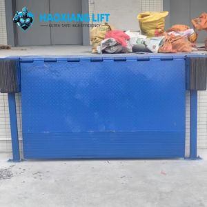 China Plataforma de elevación de tijeras fija: gran solución de gran altura para el transporte de carga de almacén con ahorro de espacio personalizado + nivelador de muelle montado en el borde on sale