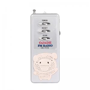 Cute pig design handheld fm radio with mini flashlight powered dry batteries