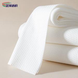 China 30x70cm Disposable Rags Cloth White Spunlace Nonwoven 80GSM Disposable Hair Towels supplier