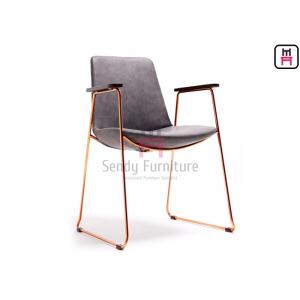 China Rose Gold Armrest Stainless Steel Restaurant Chairs With Antique Leather Covered supplier