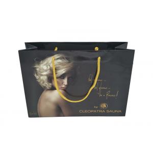 China Custom print wholesale glossy laminated wide bottom gift paper bags for clothing supplier