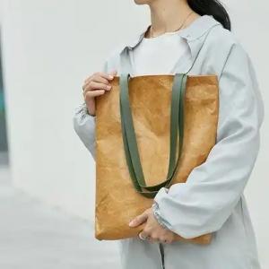 China Brown Tyvek Paper Washable Tote Bags Sustainable Bio Degradable With Leather Handle Strap supplier